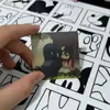 Ataque a los Titanes Tarjeta Lenticular 3D Eren Mikasa Beso del Mundo Merchandising Colgante como Regalo para Mejor Amigo