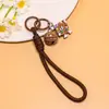 Nuevo llavero creativo lindo de galleta con cordón, accesorio de colgante DIY, accesorio de galleta de queso para mujeres