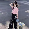 Conjunto de Duas Peças Verão 2026 para Meninas Estilo Coreano Casual Camiseta de Manga Curta com Cordão e Renda Calça de Perna Larga