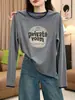 La camiseta de manga larga de algodón puro más vendida de este año para mujer, una prenda elegante y versátil perfecta para usar en capas en otoño, con un diseño único y moderno.