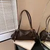 Bolso de hombro elegante Ladepao para mujer, un nuevo bolso cruzado de lujo ligero con un diseño texturizado, perfecto para ir al trabajo, 2026 gamuza retro belleza versátil