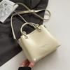 La nueva moda de este año, bolso tipo cubo simple, de personalidad, versátil, portátil, para mujer, uso diario, para ir al trabajo, ocio, bolso de mensajero de alta gama