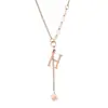 Suministro Transfronterizo Collar Sencillo de Acero de Titanio para Mujer con Colgante de Letra con Borla, Cadena para Clavícula Versátil con Estilo Hip-Hop para Mujer