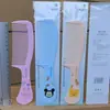 Lindo peine de estilizado y rizador de colores macarrón para uso en casa, peine de rodillo para dormitorio de estudiante, cepillo de pelo de plástico esponjoso con cojín de aire