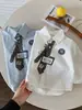 Camisas para Niños 2026 Otoño Nuevo Estampado Digital Dibujos Animados Camisas Personalizadas Bebé Estilo Coreano Versátil Camisas de Algodón de Color Sólido