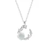 Collar de plata de ley S999 dulce alto diseño sentido corona mujeres retro elegante camelia clavícula collar al por mayor