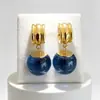 Brincos de joias de arco de design retrô de nicho vintage antigo médio, brincos de esmalte azul de alta qualidade
