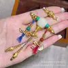 Nuevo Producto Xueba Vidrio Juego de Tres Vías Accesorios Culturales DIY Pulsera Cuentas Espaciadoras Cuerda Trenzada Colgante Accesorios Creativos