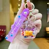 Llavero de helado de arena movediza acrílico de dibujos animados, botella de deriva líquida rellena de aceite, pequeño colgante lindo, accesorio para bolso, venta al por mayor