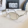 Moda europea y americana 2024 gafas de sol de moda personalizadas de metal con montura pequeña forma ojo de gato protección UV gafas de sol de moda para hombres y mujeres