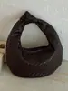 Bolso tejido de gran capacidad con patrón vintage para primavera y verano para mujer, nuevo bolso de hombro casual para commuting 2026, bolso de mano tipo empanada