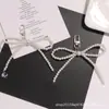 Nuevo Colgante Llavero de Perlas y Lazo Estilo Nicho, Decoración de Bolso Moderna y Única, Correa Personalizada para Teléfono