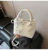 Bolsa Balde Portátil de Design de Nicho Feminina 2026 Nova Primavera Estilo Coreano Chique Bolsa para o Dia a Dia Bolsa de Ombro Único Transversal Tendência