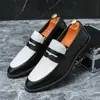 Comércio Exterior Tamanho Grande Primavera 2026 Sapatos de Couro Color-Blocking Preto e Branco Tamanho Grande Mocassins Slip-On Negócios Transfronteiriços Casuais Sapatos Masculinos