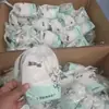 Almacenamiento Colgante Estilo Coreano Perezoso Toalla Suave de Algodón Toalla Facial Pequeña Blanca Fragante Bolsa de Almacenamiento de Viaje Bolsa de Cosméticos