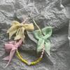 Cordón para teléfono móvil con lazo de perlas de lujo, estilo coreano, hecho a mano, con cuentas que combinan con todo, adornos colgantes para bolso, corazón colorido para niña