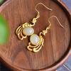 Pendientes de fénix estilo chino retro imitación jade natural Hetian pendientes estilo madre femenina estilo antiguo pendientes femeninos gancho de oreja de oro
