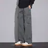 Calça de trabalho masculina de algodão estilo americano para o outono, apresentando um design retrô, minimalista e sofisticado com múltiplos bolsos e corte reto para um visual casual.