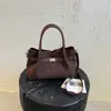 Bolso Retro de Alto Valor Nuevo Estilo Otoño 2026 Popular Exquisito Color Sólido Viaje Cotidiano Sensación Relajada Bolso Pequeño Cuadrado de Hombro Único