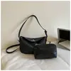Bolso de mano de lujo de alta gama para mujer, nuevo bolso tipo albóndiga tejido con patrón vintage 2026, bolso cruzado y de hombro casual para el día a día