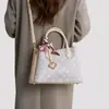 Bolsa Feminina de Brocado Zhuang de Guangxi Patrimônio Cultural Imaterial Grande Capacidade Bolsa para Mãe 2026 Novo Modelo Bolsa de Ombro Único Transversal de Mão