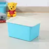 Caja de almacenamiento de plástico apilable para artículos varios con tapa caja pequeña de almacenamiento para el hogar ropa juguetes para niños caja organizadora venta al por mayor