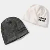 Gorro Holgado de Poliéster Personalizado Transfronterizo con Logo para Mujer Otoño e Invierno Color Sólido Gorro de Punto Cálido Venta al por Mayor Dropshipping