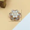 Accesorios de aleación una variedad de patrón placa de flor hebilla de perforación rhinestone perla diy accesorios para ropa accesorios de joyería hechos a mano fabricantes