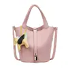 Bolso de mano de verano para mujer 2026 nueva moda coreana de nicho tipo cubo bolso bandolera súper popular