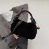 Bolso pequeño cuadrado de color liso estilo coreano para mujer, nuevo diseño 2026 casual y apto para el trabajo, bolso de hombro o bandolera simple y retro