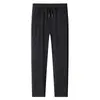 Pantalones Casuales para Hombre Primavera/Verano 2025 Delgados de Seda de Hielo Cuatro Pruebas Elásticos con Cordón Juventud y Edad Media Elásticos Anti-Arrugas Frescos Largos