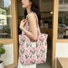 Bolsa de mano de algodón floral estilo coreano, un bolso versátil y elegante que se puede llevar en la mano o colgar al hombro, perfecto para estudiantes mujeres, ligero y con gran capacidad, ideal para llevar libros a clase