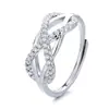 Adornos de Recursos Transfronterizos de Cruz Retorcida Europea y Americana Joyería Anillo de Amor Infinito con Línea Microincrustada de Circonita Anillo de Dedo Ajustable