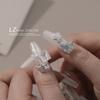 Joyas de diamantes para uñas de celebridad de internet LZ con circonita cadena larga mariposa perla pajarita decoraciones de uñas al por mayor