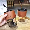 Xinzhou Minimalista Cordón Acero Inoxidable 316 Taza Térmica Alto Valor Separación Té y Agua Asa Portátil Taza de Agua Regalo