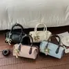 Bolso de Mano Japonés Coreano de Lujo Ligero de Nicho para Mujer Otoño Temprano 2026 Bolso Almohada de Temperamento para Viajar al Trabajo Bolso Cruzado Casual de Gama Alta