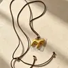 2026 Nueva Moda Coreana Otoño e Invierno Collar Cepillado de Poni para Hombres y Mujeres Simple Elegante Cadena Larga para Suéter con Colgante