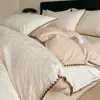 Juego de cuatro piezas de algodón 100% algodón lavado jacquard borde de concha funda nórdica de algodón puro sábana bajera faldón de cama ropa de cama de alta calidad para dormitorio principal
