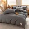 Conjunto de cama minimalista de algodão puro personalizado de quatro peças lençol de cama de dormitório capa de edredom conjunto de três peças para estudantes lençol com elástico fabricante de roupa de cama atacado