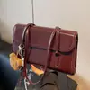 Bolso vintage para mujer, gran capacidad, nuevo otoño e invierno 2024, informal, combinable, de alta gama, bolso de trabajo de un solo hombro para mujer.