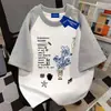 Camiseta de Manga Corta Algodón 100% Personalizada para el Trayecto Holgada Adelgazante para Hombres y Mujeres Verano Tacto de Alta Gama Parche de Estrella Superior Moderno