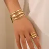 Conjunto de pulseira e anel em ouro com design europeu e americano transfronteiriço, moderno e único, design aberto exagerado, conjunto de duas peças de joias de luxo leve