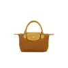 Nova Mini Bolsa Outono e Inverno 2025, Bolsa de Mão de Couro Bovino de Ombro Único Transversal, Bolsa Dumpling Versátil da Moda de Nicho