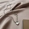 Ins europeo y americano Red social retro corazón de amor colgante de corazón hebilla de langosta collar viento metálico