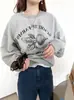 Moletom Redutor de Idade Estampado com Gola Redonda Solto e Confortável para Mulheres Primavera e Outono Novo Oversize Estilo Preguiçoso Blusa de Pulôver com Capuz
