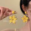 Brincos de flores coloridas de primavera estilo de férias à beira-mar em nicho de design senso simples moda brincos de alto senso