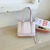 Bolso de mano de alta gama para mujer 2026 nuevo y moderno para salidas de primavera, bolso de hombro, bolso cruzado tipo cubo elegante y exquisito