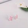 Runxin pendientes creativos coreanos de aceite rosa que gotea flor de cinco pétalos para mujer moda pequeña fresca y encantadora pendientes de flor innovadores