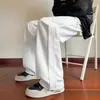 Pantalones casuales de calle estilo americano con remaches para hombre, pantalones largos holgados de pierna recta fluidos para primavera y otoño, pantalones de chándal de pierna ancha para deportes al aire libre