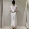 Tallas actualizadas: Conjunto elegante de top sin mangas de verano nuevo estilo coreano + falda con cinturón para mujer 2026